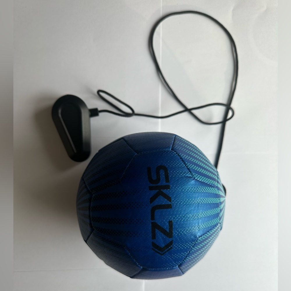 Blue SKLZ star-kick solo soccer trainer with size 1 ball
